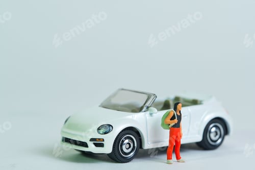 Preview: a young man with a backpack stands in front of a white cabriolet car, miniature figures scene