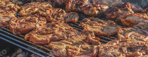 Preview: Panoramic closeup shot of pork meat steak on barbecue grill