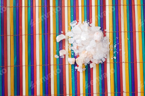 Preview: close up of pink rock salt in a bowl on table