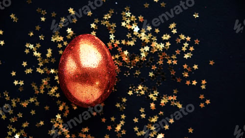 Preview: one golden easter eggs on black background. banner for text