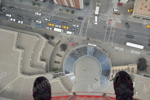 Preview: Directly above shot from high building through the glass