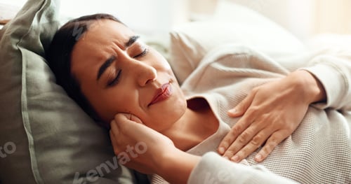 Preview: Woman, sore chest and cold in home, virus influenza and laying on bed with bacteria infection. Fema