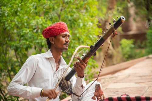 Preview: Street musician playing music instrument