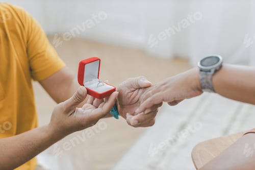 Preview: Will You Marry Me Concept. young girl happy and surprise.