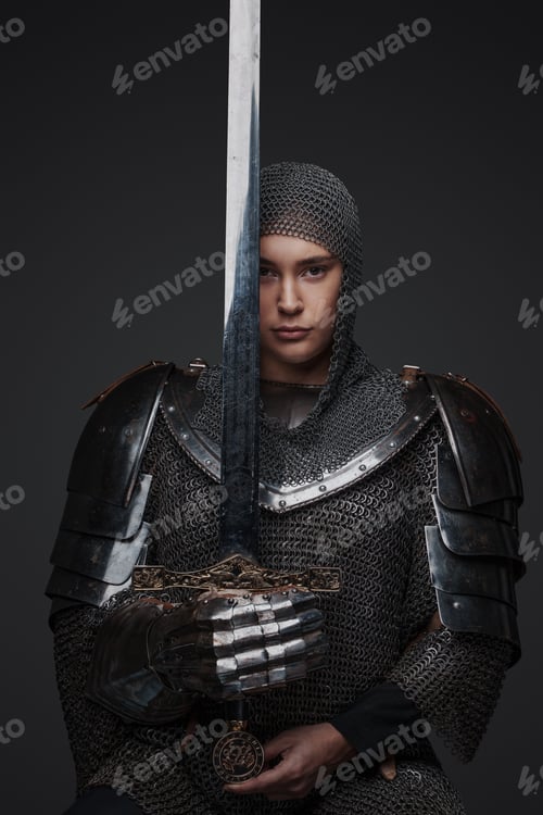 Preview: Isolated on grey female knight holding steel sword