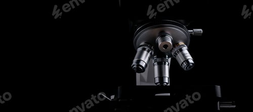 Preview: Closeup of Scientific microscope isolated on black, data analysis in the laboratory