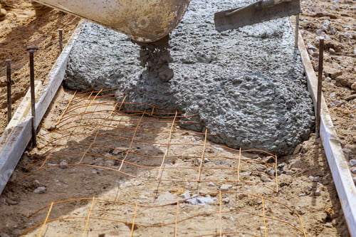 Preview: Cement mixer truck pouring cement during sidewalk