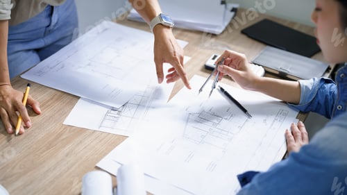 Preview: Engineering construction concept, Female engineer use geometry compass drawing circle in blueprint