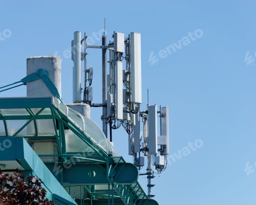 Preview: Radio tower with multiple antennas on top of a building