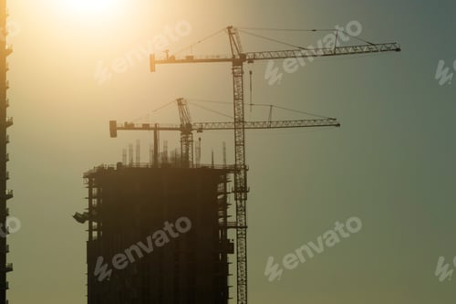 Preview: New construction site of developing residense in american urban area at sunset.