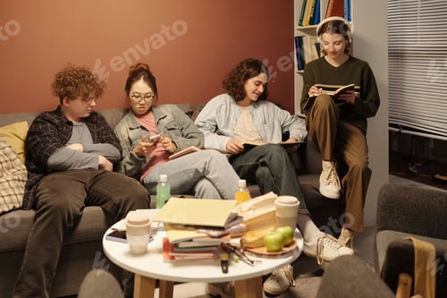 Preview: Students Relaxing Together on Couch