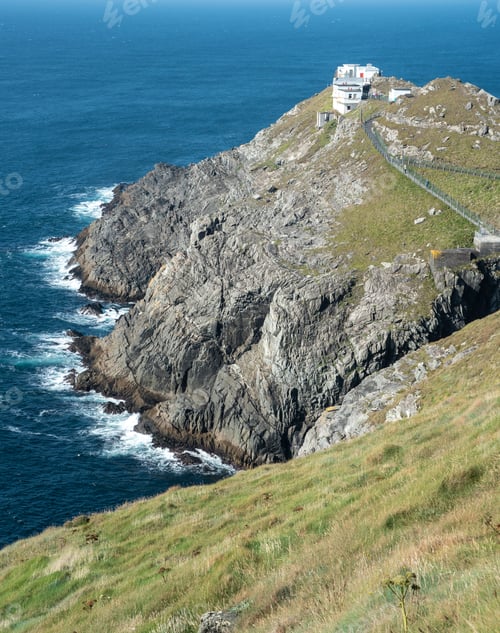 Preview: Mizen Head Signal Station in the atlantic ocean. County Cork, Ireland