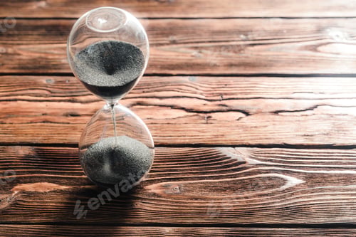 Preview: Modern hourglass on wooden background