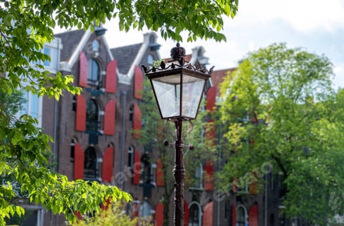 Preview: Amsterdam medieval lantern, streetlight. Blur house background, Holland Netherlands.