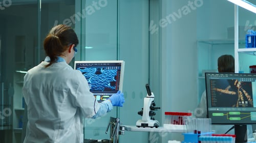 Preview: Medical nurse positing medical monitor working on it