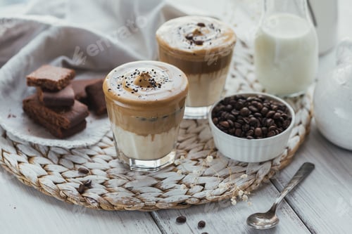 Preview: Glass of Iced Dalgona Coffee, trendy fluffy creamy whipped coffee and milk