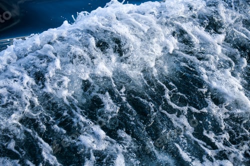 Vista previa: Deep blue water waves wake from a boat