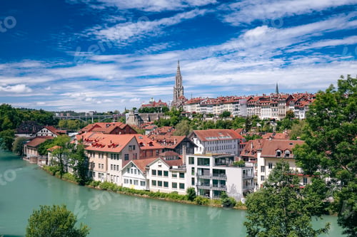Preview: A sunny day in Bern, Switzerland showcasing the historic architecture along the Aare River