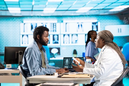 Preview: Black medic expert and patient discussing diagnostic feedback and records