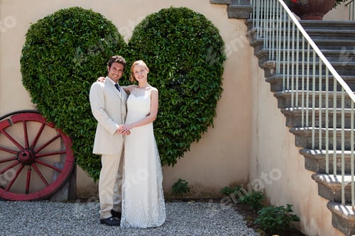 Preview: Newlyweds by heart shaped bush