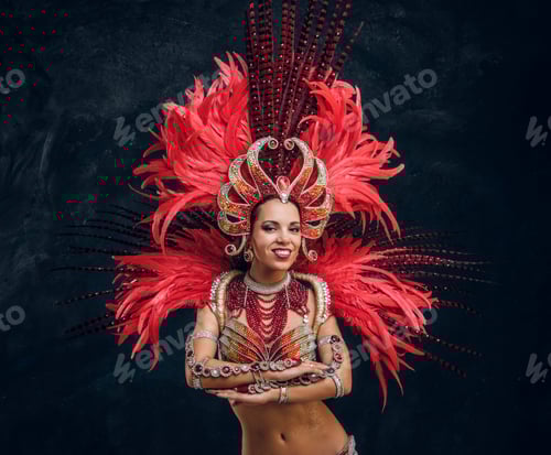 Preview: Beautiful brazil dancer in red feather costume is dancing on small scene