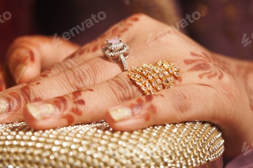 Preview: Jewelry and henna on hands at a celebration