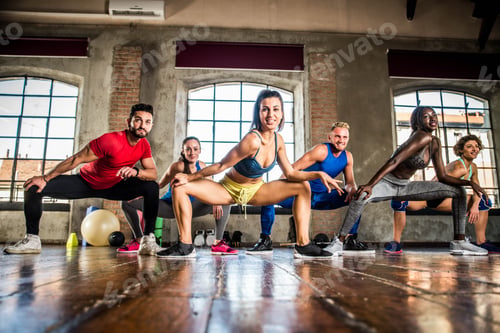 Preview: Athletes training in a gym