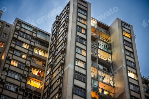 Preview: Evening glow from residential windows in Hong Kong, showcasing daily life and urban living