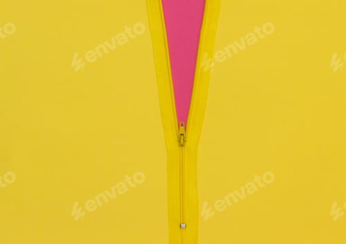 Preview: Yellow zipper unzipped half way showing pink color under a yellow background