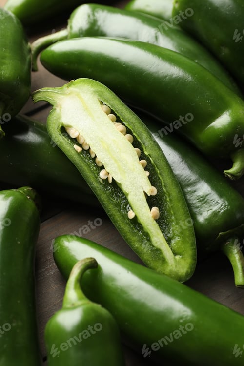 Preview: Fresh jalapeno peppers on wooden table, closeup