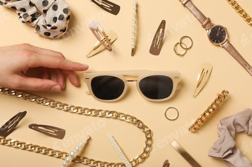 Preview: Beige sunglasses with feminine decorations around, on a beige background