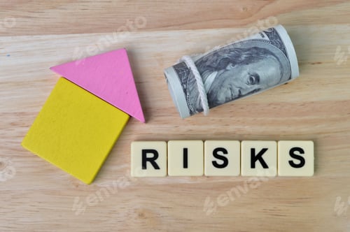 Preview: Top view of wooden blocks, money banknote and square letters with text RISKS.