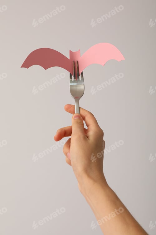 Preview: Table setting for Halloween, a bat on a fork