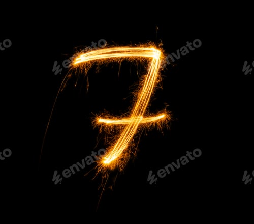 Preview: Fireworks numbers 7 Burning sparkler Numbers isolated on black background. Sparkler firework light