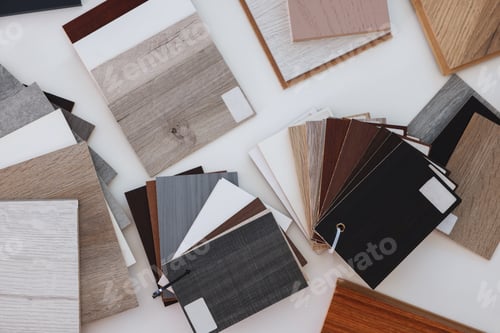 Preview: Different samples of wooden flooring on white table, top view