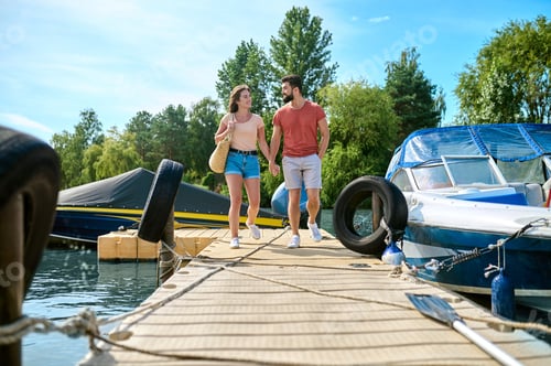 Preview: A man and a woman on a dock after a boat trip