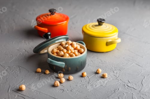 Preview: Chickpeas in asaucepan on a gray background