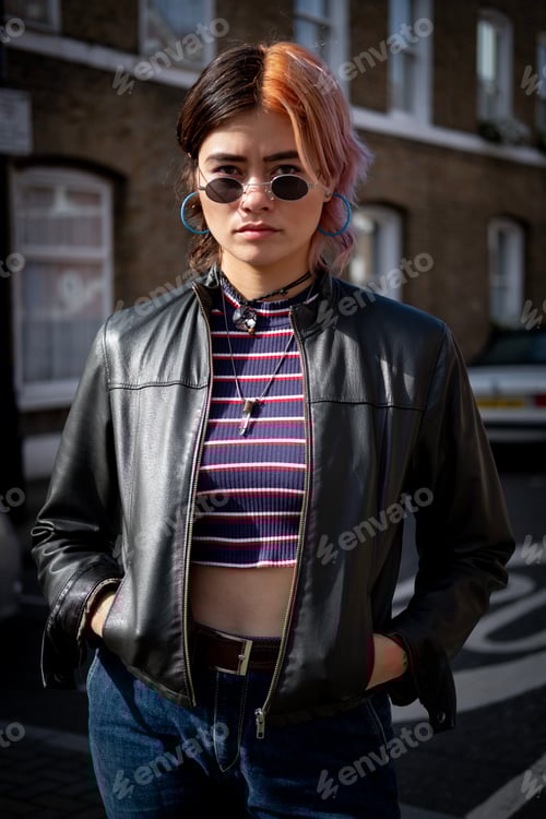 Preview: Mixed race woman posing in London street.