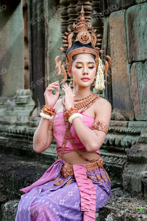 Preview: portrait of beautiful woman in old Thai suit or Thai national dress suit looks charming.