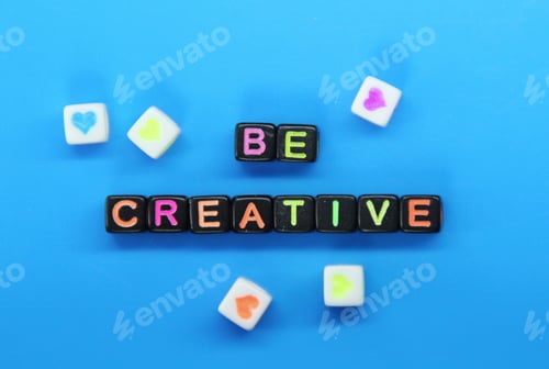 Preview: letters in black oetak with the word be creative.