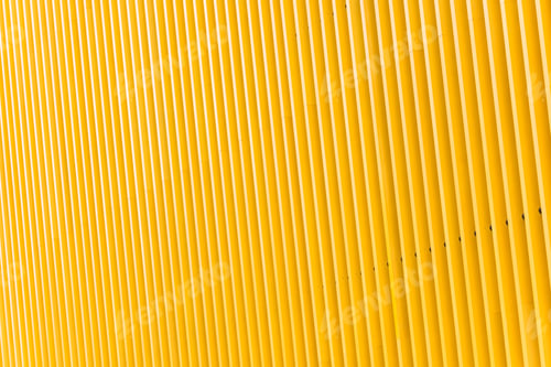 Preview: Detail of yellow metal building facade