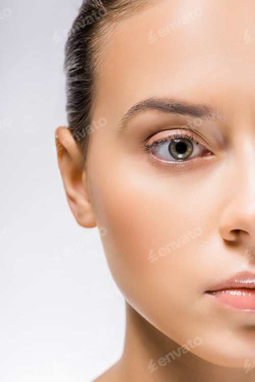 Preview: cropped face of young beautiful woman with nude makeup