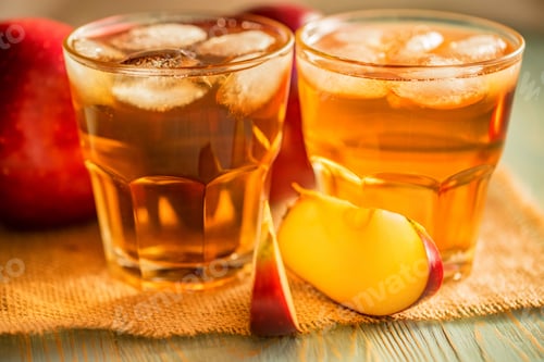 Preview: Fresh apple juice or cider in glasses on table