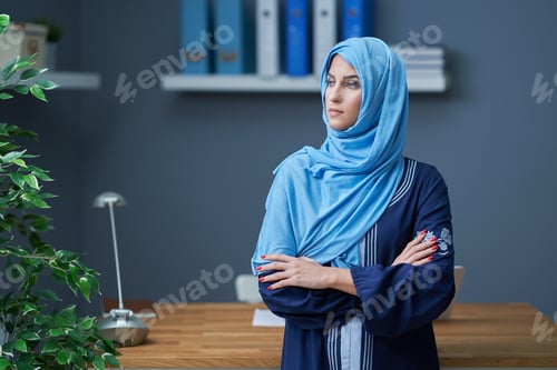 Preview: Muslim female student learning at home