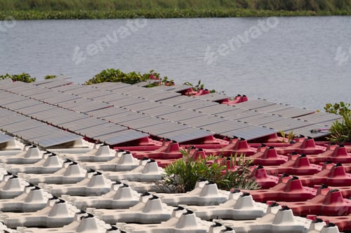 Preview: Renewable Energy Eco Technology Electric Power. Floating solar panels on lake.