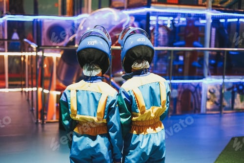 Preview: Boys friends in the amusement game room, flying in an air tube, go-kart racing