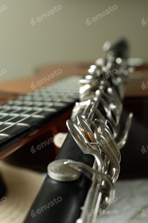 Preview: Classical guitar, clarinet and hat, close up and selective focus