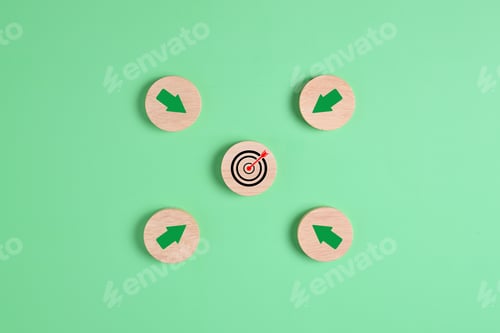 Preview: Target goal and arrow icons with magnifying glass on wooden blocks for business strategy planning