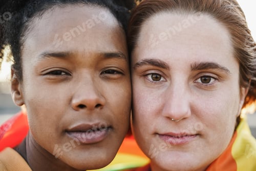 Preview: Young women gay couple looking at camera outdoor - Lgbt and love concept - Focus on right girl eyes