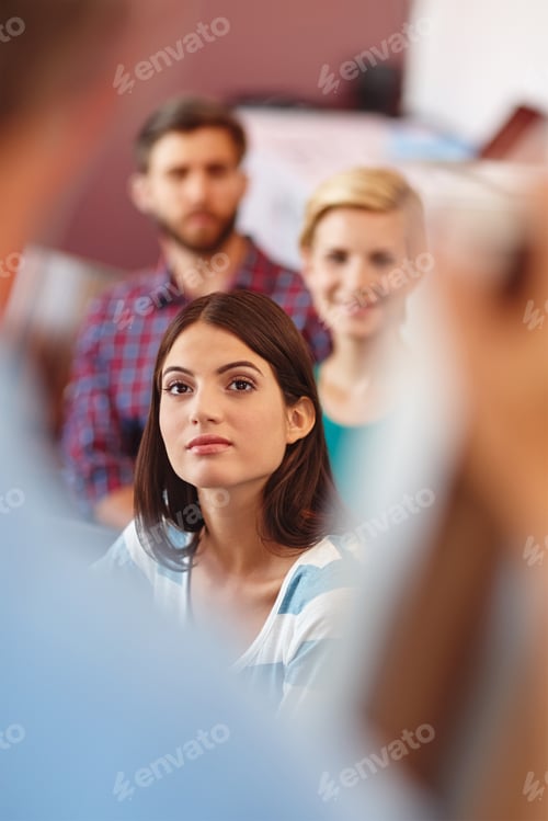 Preview: Always keep an open mind. Shot of a group of coworkers listening to a presentation.